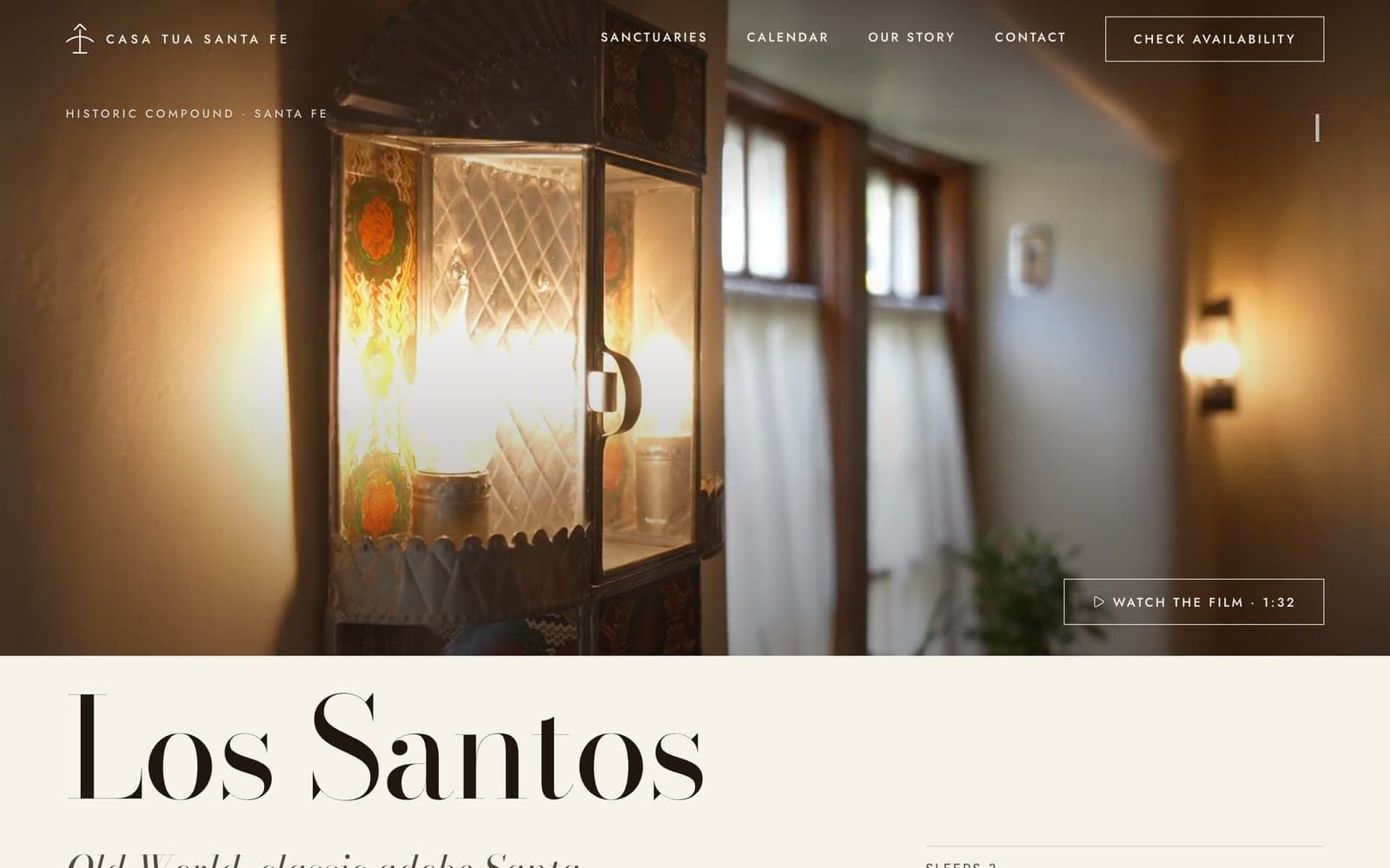 The Los Santos page: a film still of a lit lantern by a deep adobe window, a Watch the film button marked 1:32, and the name Los Santos