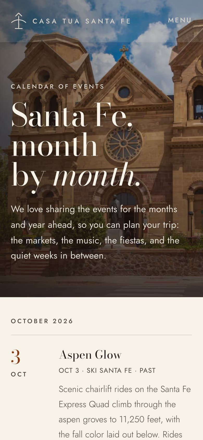 The Calendar page on a phone, headed Santa Fe, month by month, over the Cathedral Basilica