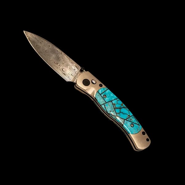 Feathers Galleria product photography — heritage blade