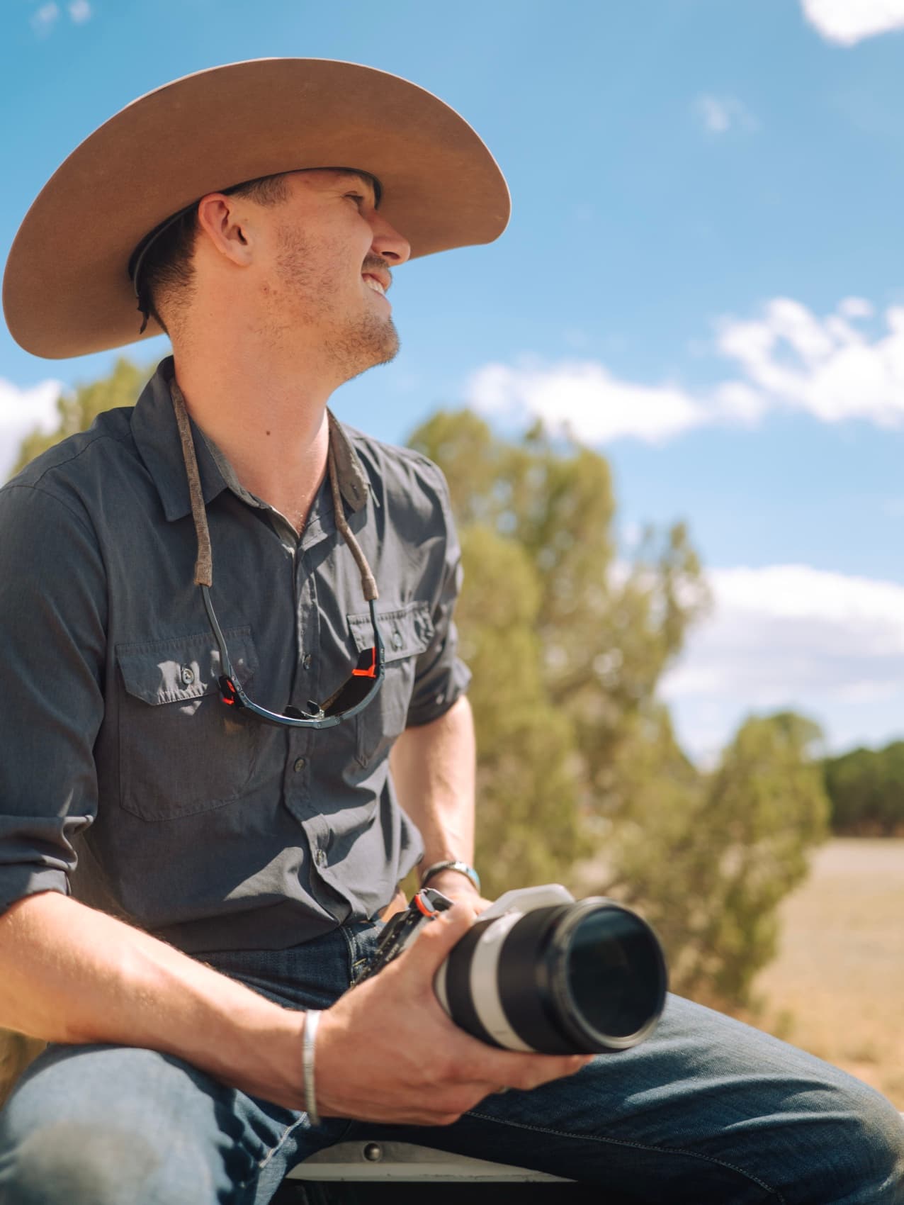 Wes — Co-Founder of Creative Flow Studio, with his camera at the ranch
