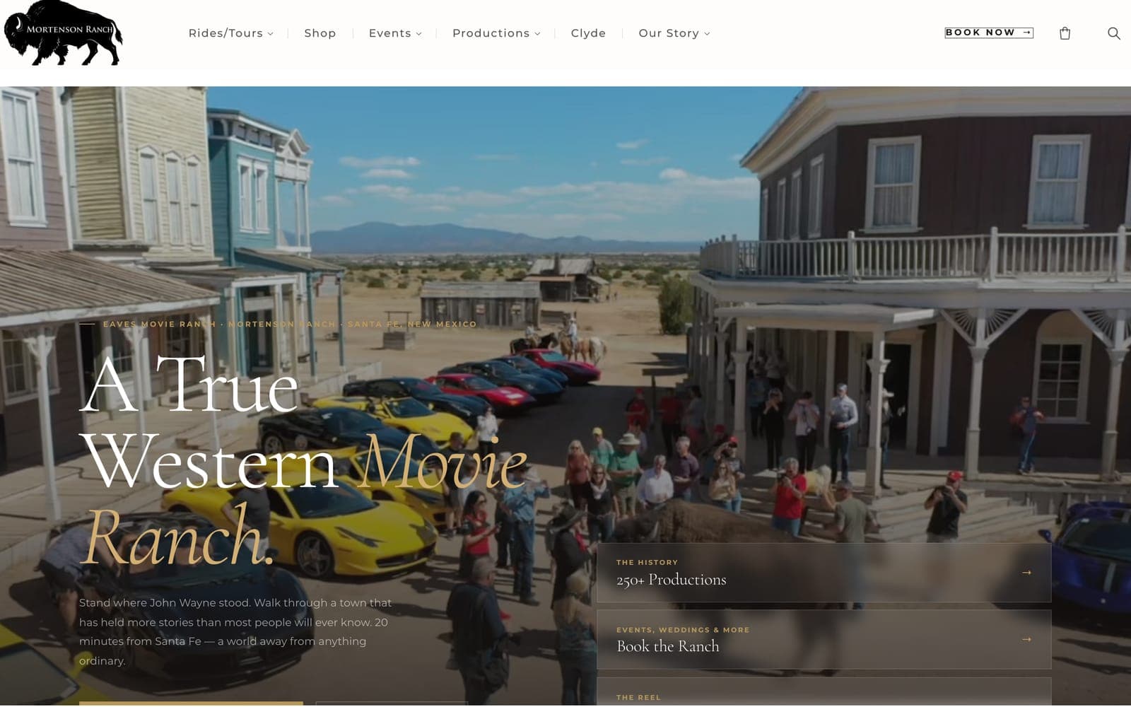 The movie ranch page: a crowd and classic cars on the western set under the headline A True Western Movie Ranch
